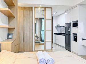 Kuchyň nebo kuchyňský kout v ubytování Stylish Studio SouthGate Apt with Pool, Gym, Netflix by 2ndHome