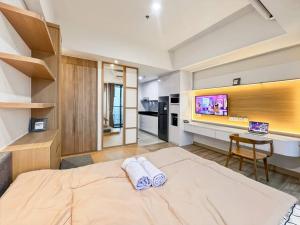 Postel nebo postele na pokoji v ubytování Stylish Studio SouthGate Apt with Pool, Gym, Netflix by 2ndHome