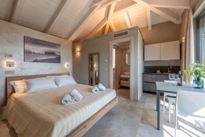Kuchyň nebo kuchyňský kout v ubytování Basumse Holiday Apartments, Langhe