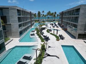 an overhead view of the pool at a resort at Porto Alto Resort GAV em Muro Alto in Cupe +39 photos