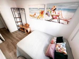 Ένα ή περισσότερα κρεβάτια σε δωμάτιο στο Casa Moderna con Garaje en Rota, cerca de Playa