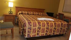 Letto o letti in una camera di Luxury Inn