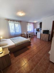 Ένα ή περισσότερα κρεβάτια σε δωμάτιο στο the old inn