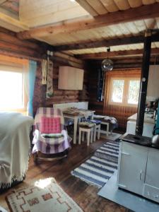 a room with a living room and a dining room at Zakątek u Basi in Twierdza