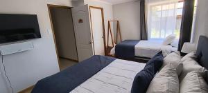 Postel nebo postele na pokoji v ubytování Casa Encino