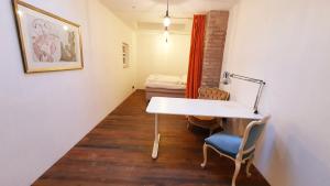 Postel nebo postele na pokoji v ubytování Helles Zimmer im Loft