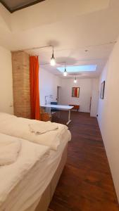 Postel nebo postele na pokoji v ubytování Helles Zimmer im Loft