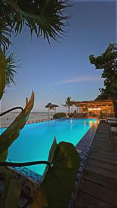 Bazén v ubytování Coco Beach Hotel nebo v jeho okolí
