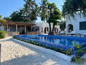 Bazén v ubytování Coco Beach Hotel nebo v jeho okolí