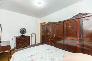 Postel nebo postele na pokoji v ubytování Memora Guesthouse Curitiba - Quartos em Casa próximo ao Parque Bacacheri