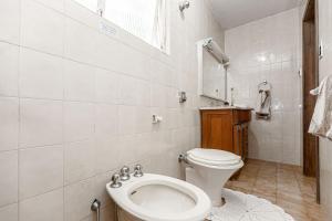 Koupelna v ubytování Memora Guesthouse Curitiba - Quartos em Casa próximo ao Parque Bacacheri
