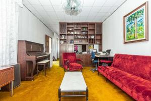 Posezení v ubytování Memora Guesthouse Curitiba - Quartos em Casa próximo ao Parque Bacacheri