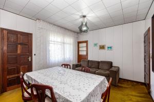 Posezení v ubytování Memora Guesthouse Curitiba - Quartos em Casa próximo ao Parque Bacacheri