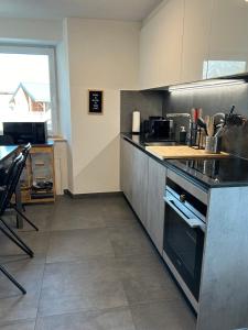 Köök või kööginurk majutusasutuses 4 valleys Modern appartment with free parking