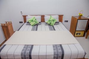 Postel nebo postele na pokoji v ubytování Hispaniola inn