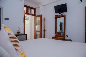 Postel nebo postele na pokoji v ubytování Hispaniola inn