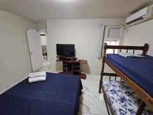 Un pat sau paturi într-o cameră la Casa Buziana - Centro