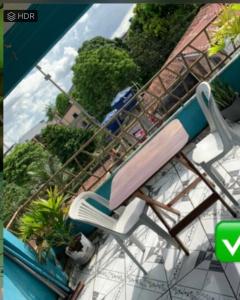a lounge chair sitting on top of a swimming pool at CasaCop30 in Belém