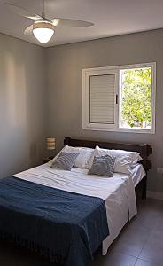 Postel nebo postele na pokoji v ubytování Casa Quinta da Vovó - Ubatuba