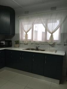 Kuchyň nebo kuchyňský kout v ubytování 83 Ocean View