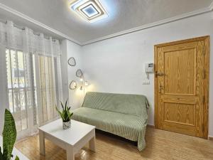 Posezení v ubytování Bonito apartamento con piscina + 47 fotografií