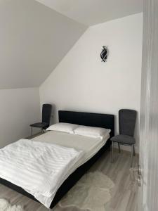 Ένα ή περισσότερα κρεβάτια σε δωμάτιο στο Apartament CASA MIRIAM +20 φωτογραφίες