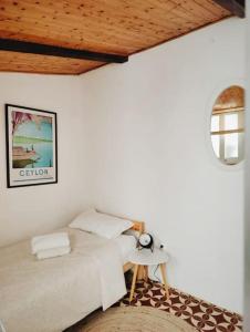 Postel nebo postele na pokoji v ubytování Semi-detached house in the historic center - Lagos