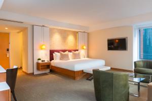 Postel nebo postele na pokoji v ubytování Concorde Hotel New York