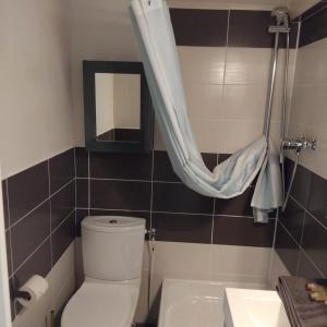 Et badeværelse på Joli studio paisible proche stade de France