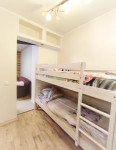 Postel nebo postele na pokoji v ubytování Muraka Apartement