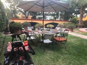 Un jardín fuera de Casa Pino Residencia de Lujo - Alberca con Caldera Incluido