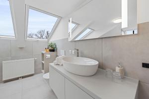Un baño de VIVE Hotel & Restaurant Vienna