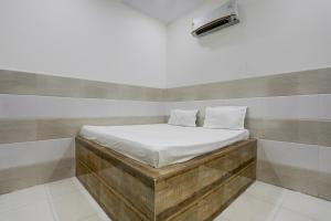 Postel nebo postele na pokoji v ubytování Hotel O YOUR RESIDENCY