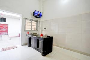 TV a/nebo společenská místnost v ubytování Hotel O YOUR RESIDENCY