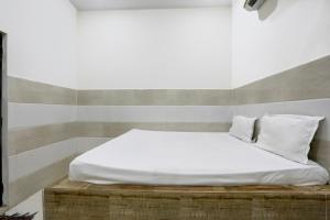 Postel nebo postele na pokoji v ubytování Hotel O YOUR RESIDENCY