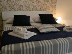 En eller flere senge i et værelse på Casa del sole