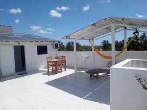 Balkón nebo terasa v ubytování Cobertura solariun com 2 suites na praia do prea