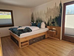 Postel nebo postele na pokoji v ubytování Panorama-Ferienhaus im Stubaital