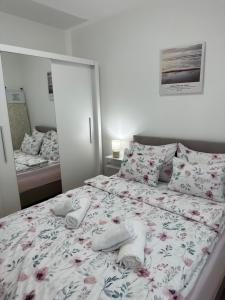 Rúm í herbergi á Apartment Athens
