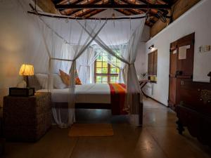 Katil atau katil-katil dalam bilik di Dunes Unawatuna Hotel