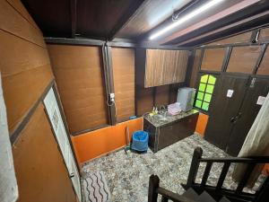 Ένα ή περισσότερα κρεβάτια σε δωμάτιο στο Homestay Jasmin +2 φωτογραφίες