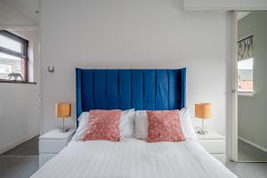 Voodi või voodid majutusasutuse Anjore House - Belfast Serviced Apartment toas