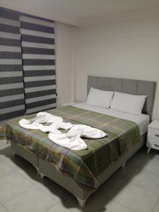 A bed or beds in a room at Apart 71