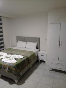 A bed or beds in a room at Apart 71