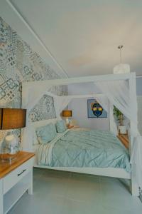 Postel nebo postele na pokoji v ubytování Hotel Mono Azul