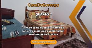 Katil atau katil-katil dalam bilik di CasaDoSossego Crianças Pets Idosos PCD