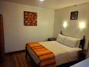 Cama o camas de una habitación en Departamentos Cusco