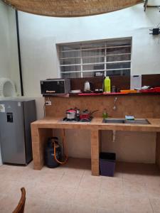 Una cocina o zona de cocina en Departamentos Cusco