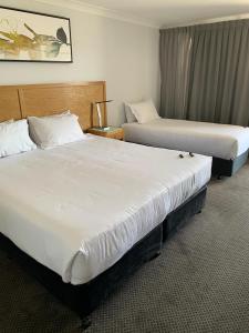 Best Western Club Quirindi Motel客房内的一张或多张床位