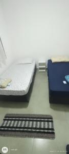 Ένα ή περισσότερα κρεβάτια σε δωμάτιο στο Apartamento Simba Safári, São Paulo Expo